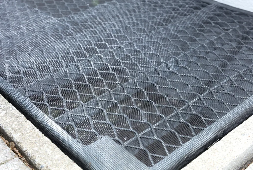 Dirt and small animal deflectors for light shafts, fiberglass fabric