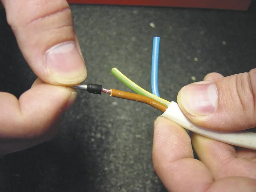 Insulated wire end ferrules assortment with pliers and screwdriver