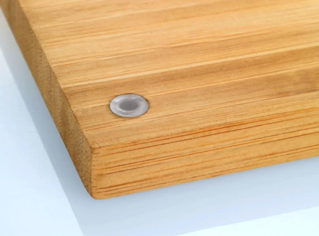 Bamboo cutting board with stainless steel drip tray