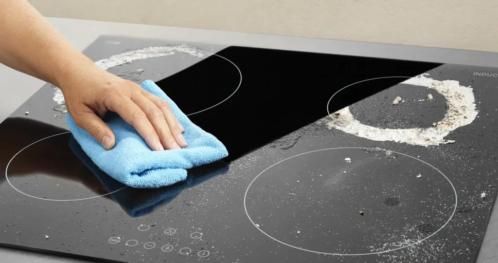 Non-stick and anti-scratch coating for hobs