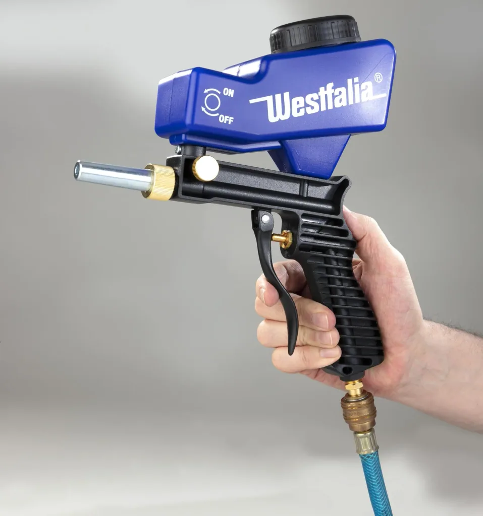 Compressed air sandblasting gun