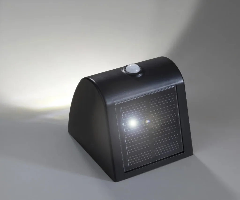 Solar wall and fence light with motion detector