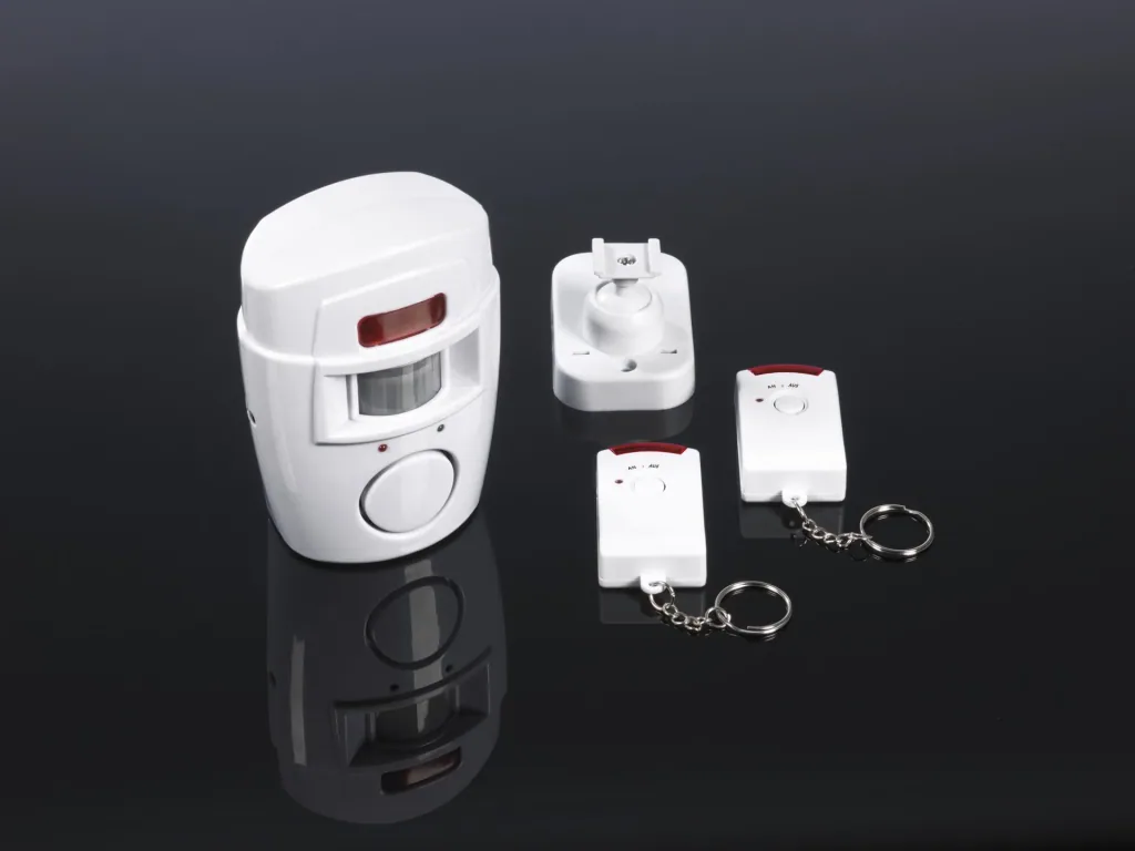 Wireless infrared alarm system with 2 remote controls