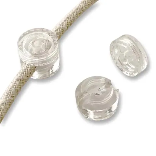 Cousin Paul wall fastening for nomade lamp cable transparent