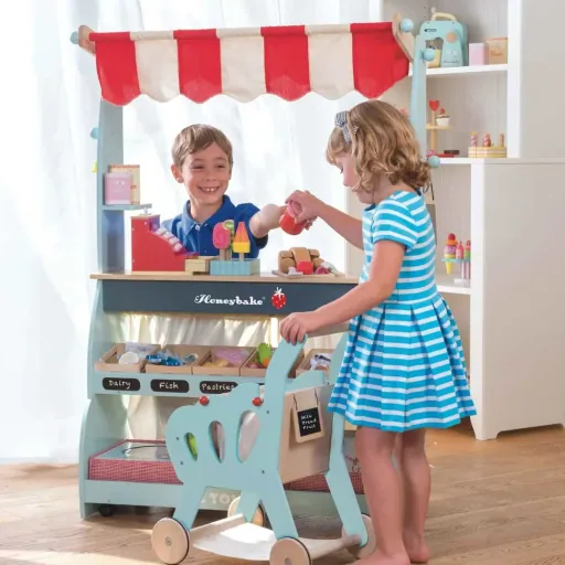 Le Toy van sales stand and Café Honeybake