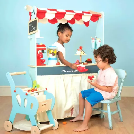 Le Toy van sales stand and Café Honeybake