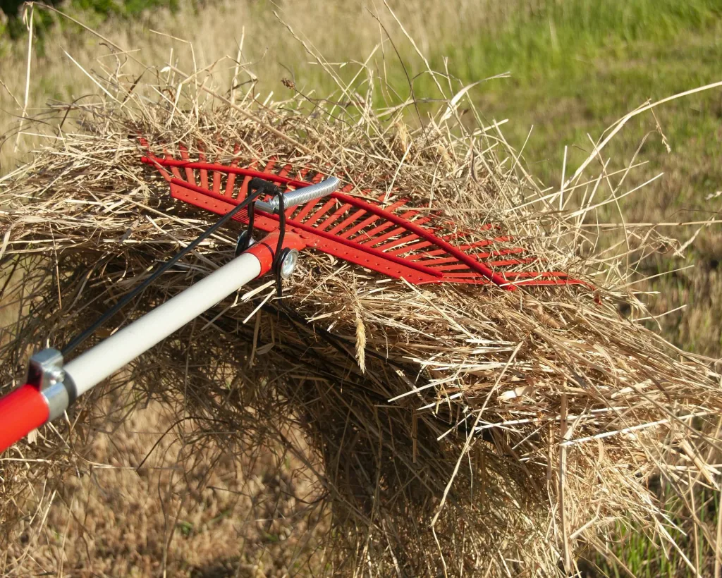 Universal rake with grapple, 25 tines, telescopic