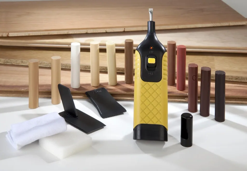Repair kit for laminate and parquet with 11 colors of hard wax sticks