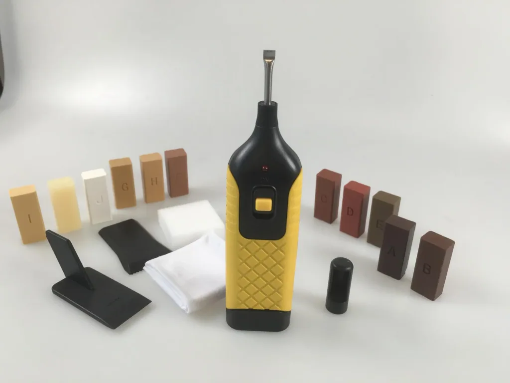 Repair kit for laminate and parquet with 11 colors of hard wax sticks