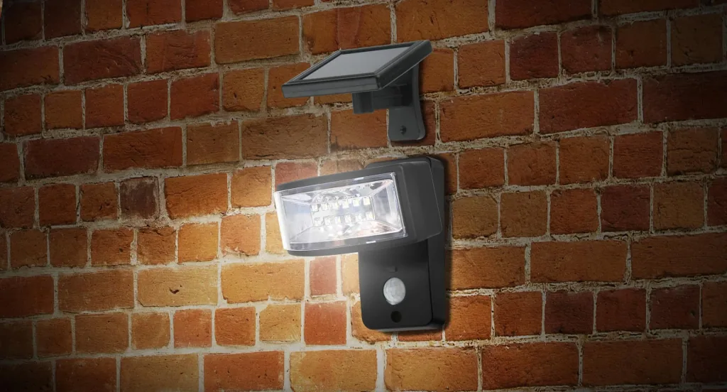 LED wall light with separate solar panel and motion detector