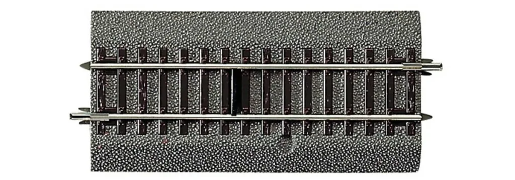 Switching track with potential-free switching contact, with bedding, length 115 mm