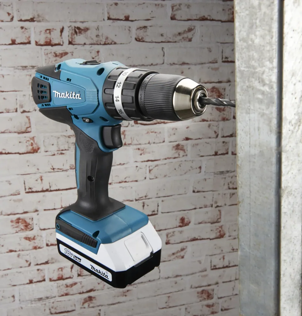 Cordless impact drill HP457DWE10, 18 Volt - 2-speed, Li-Ion with 74-piece accessories