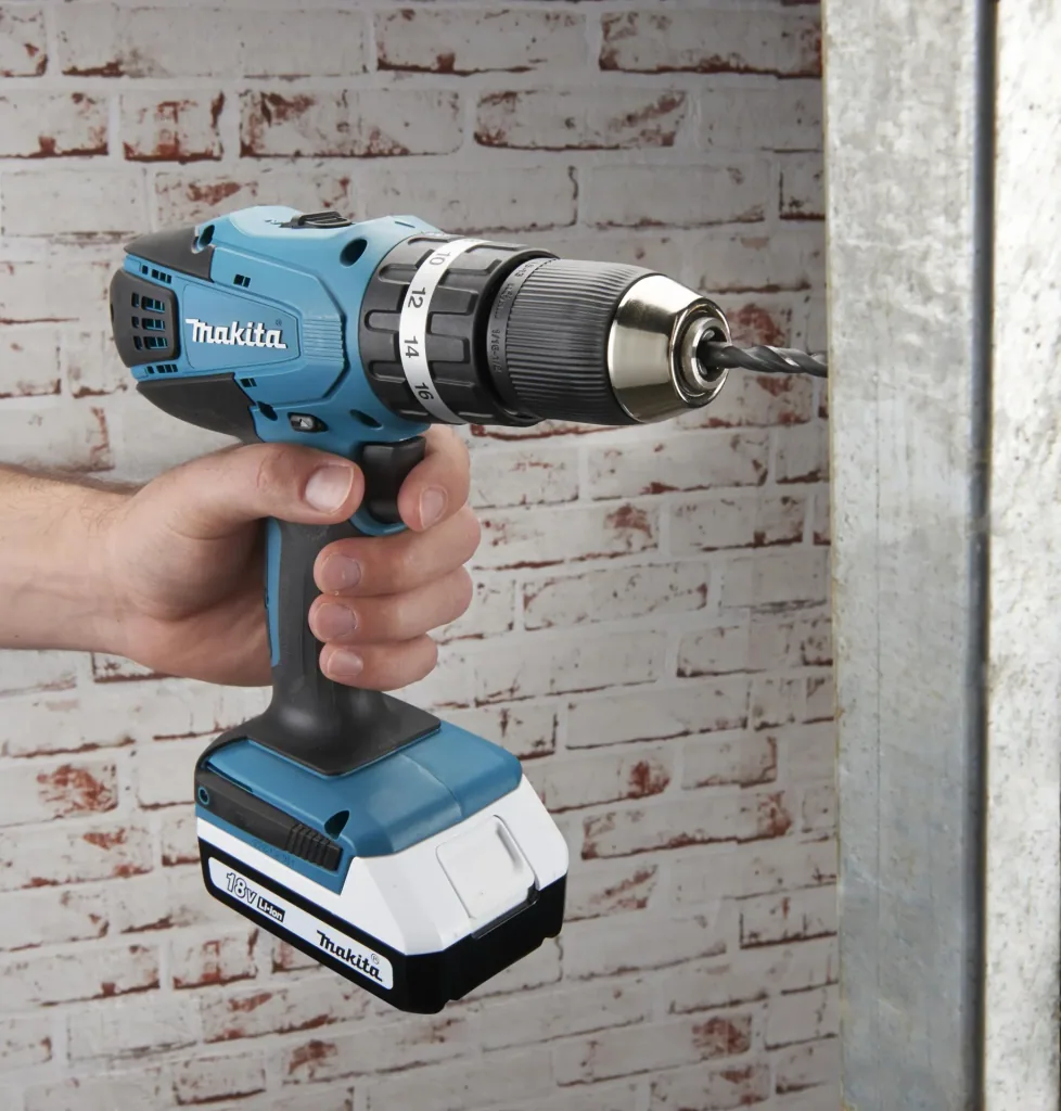 Cordless impact drill HP457DWE10, 18 Volt - 2-speed, Li-Ion with 74-piece accessories