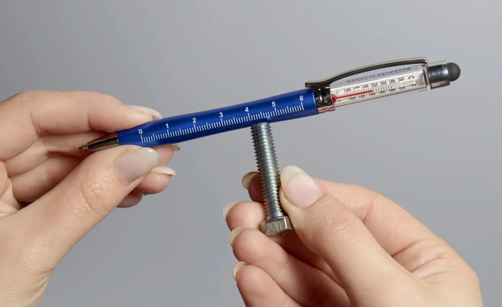 Ballpoint pen with thermometer