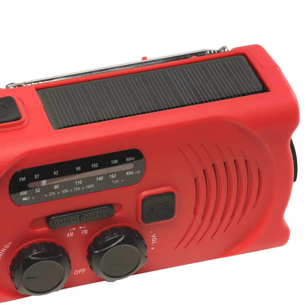 Portable solar crank radio with flashlight, rechargeable and battery operation