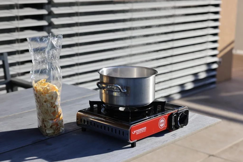Compact gas table cooker Premium RS 220 with integrated cartridge compartment