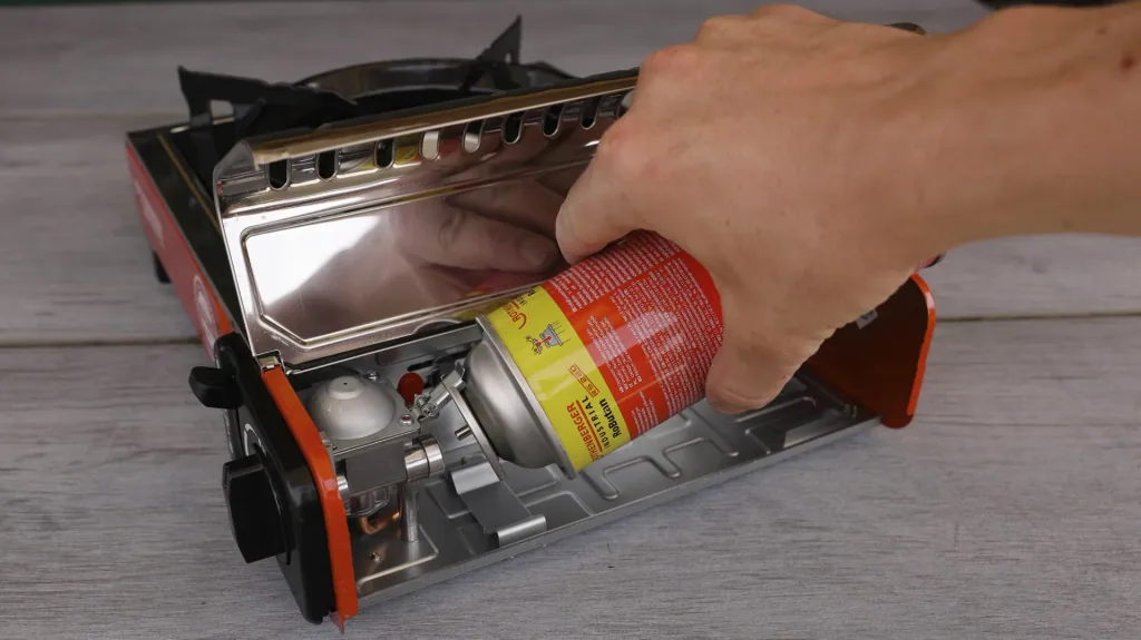 Compact gas table cooker Premium RS 220 with integrated cartridge compartment