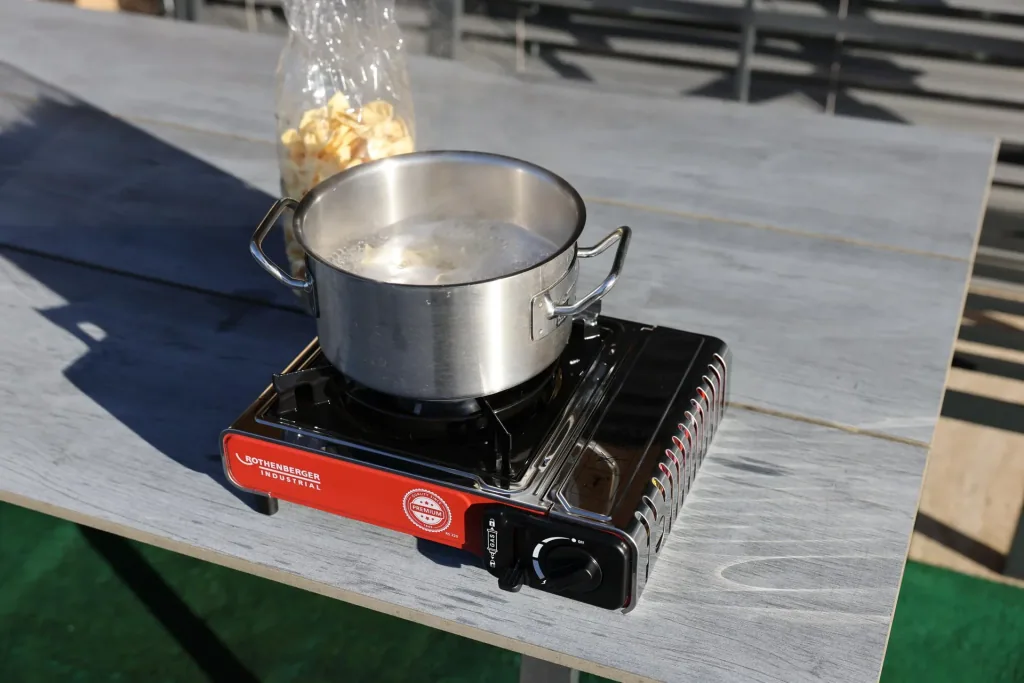 Compact gas table cooker Premium RS 220 with integrated cartridge compartment