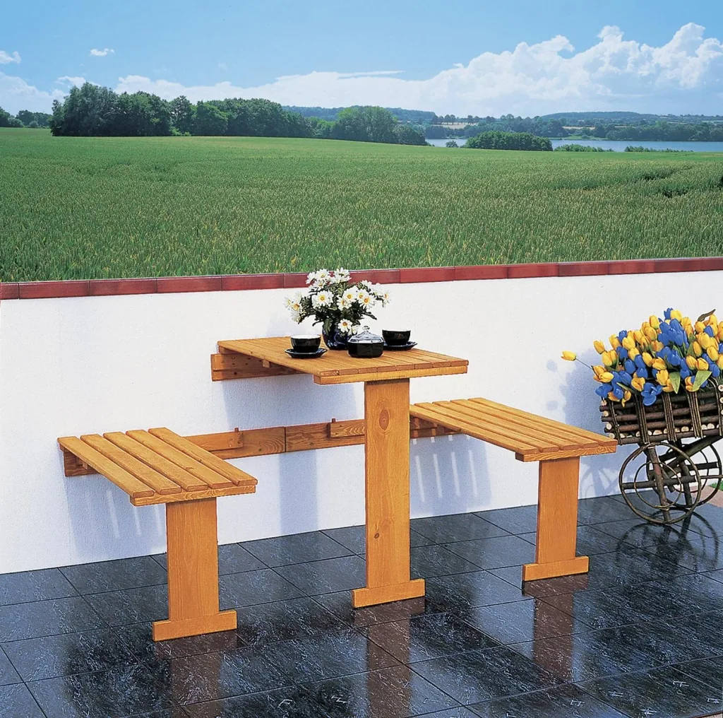 Folding balcony furniture with blue cushions
