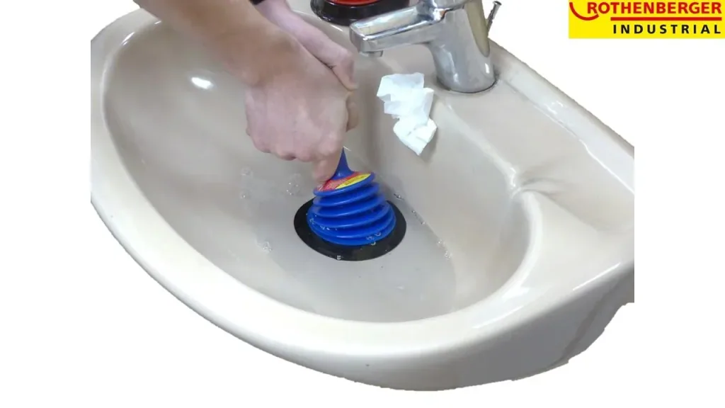Drain cleaner, plunger for clogged drains, color-sorted
