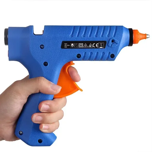 Cordless hot glue gun with charging station and system case