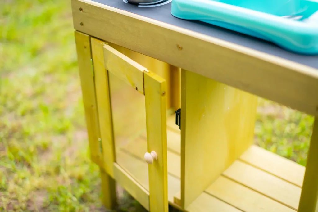 Wooden children's play kitchen with sink