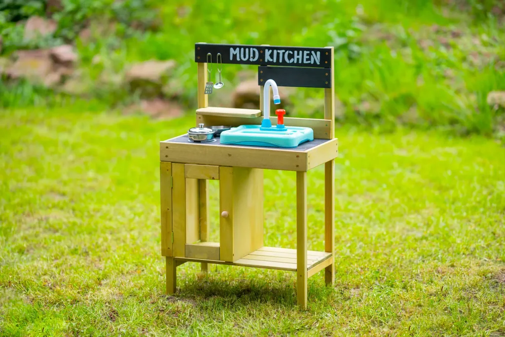 Wooden children's play kitchen with sink