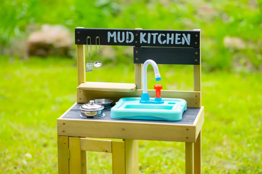 Wooden children's play kitchen with sink