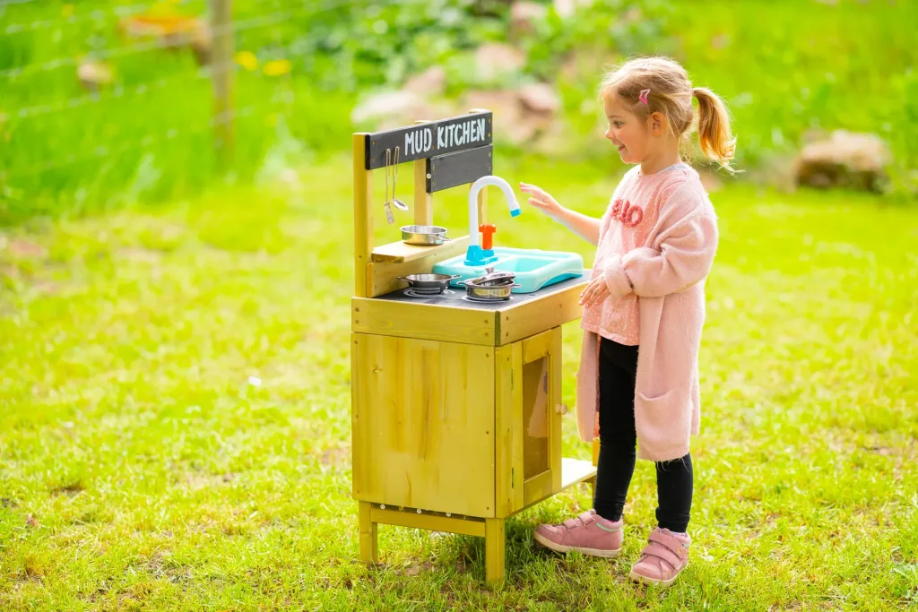 Wooden children's play kitchen with sink