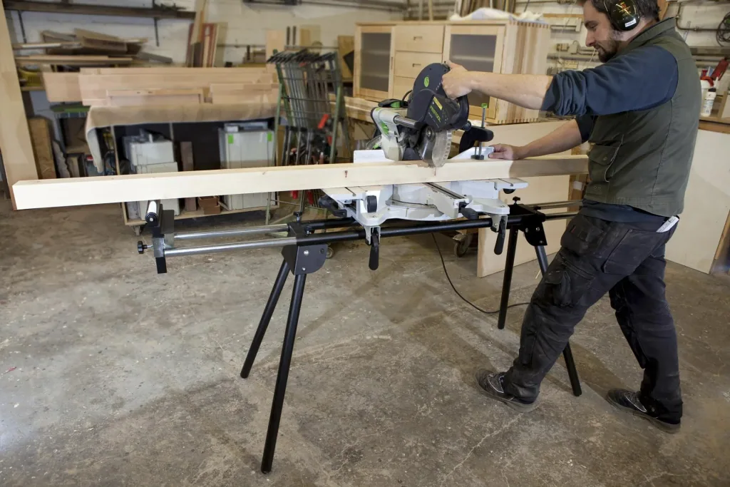 Universal machine base for miter saws