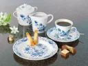 4 SOUP CUPS WITH SAUCERS IN ONION PATTERN
