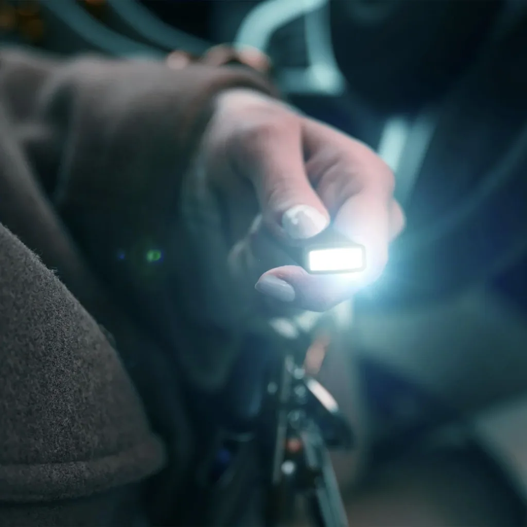 Mini LED flashlight with integrated USB-A plug, dimmable