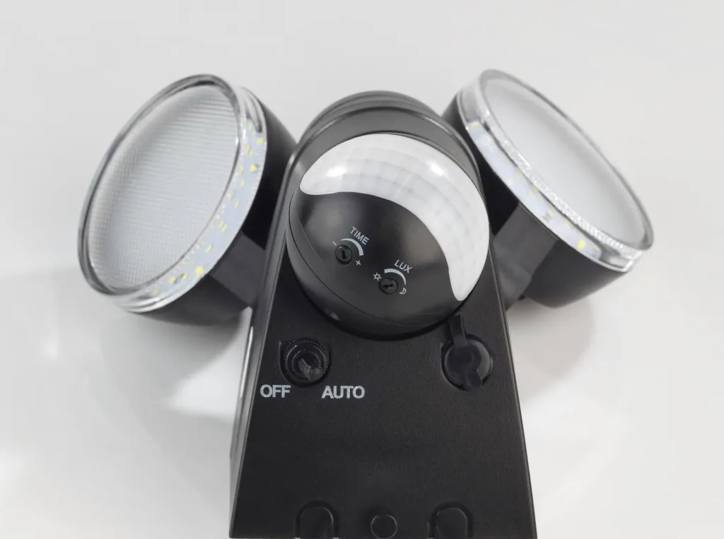 Duo spotlight with solar panel and motion detector