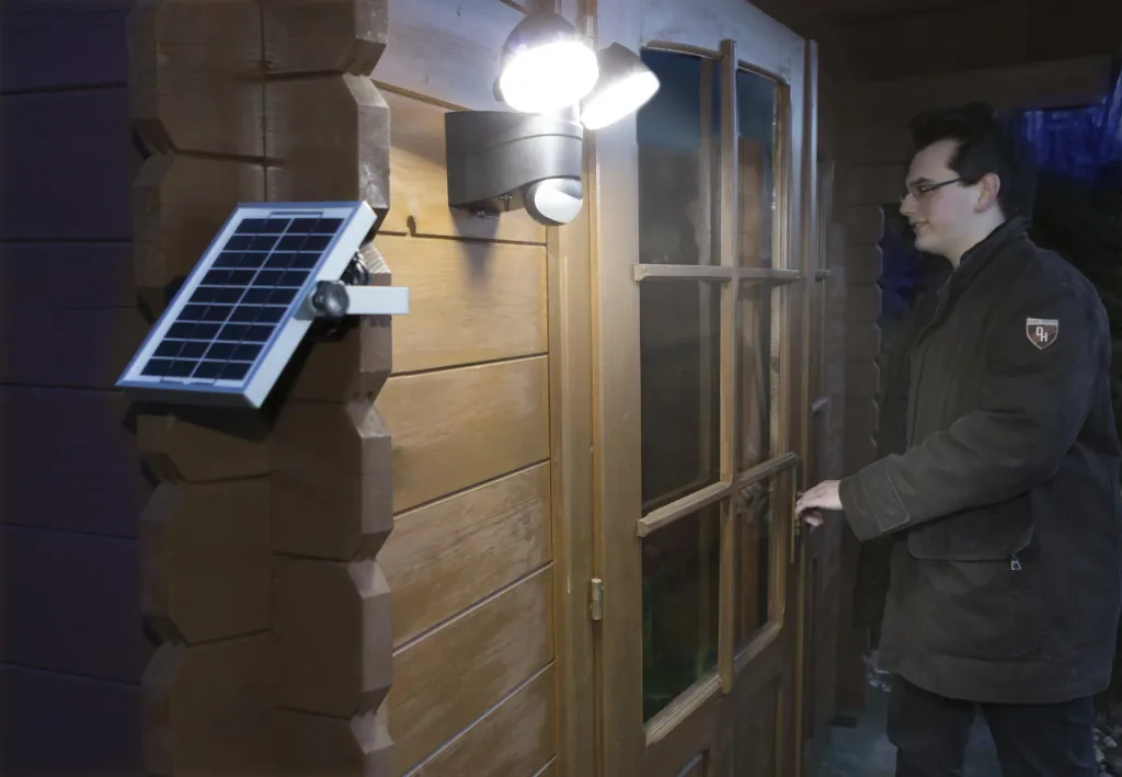 Duo spotlight with solar panel and motion detector