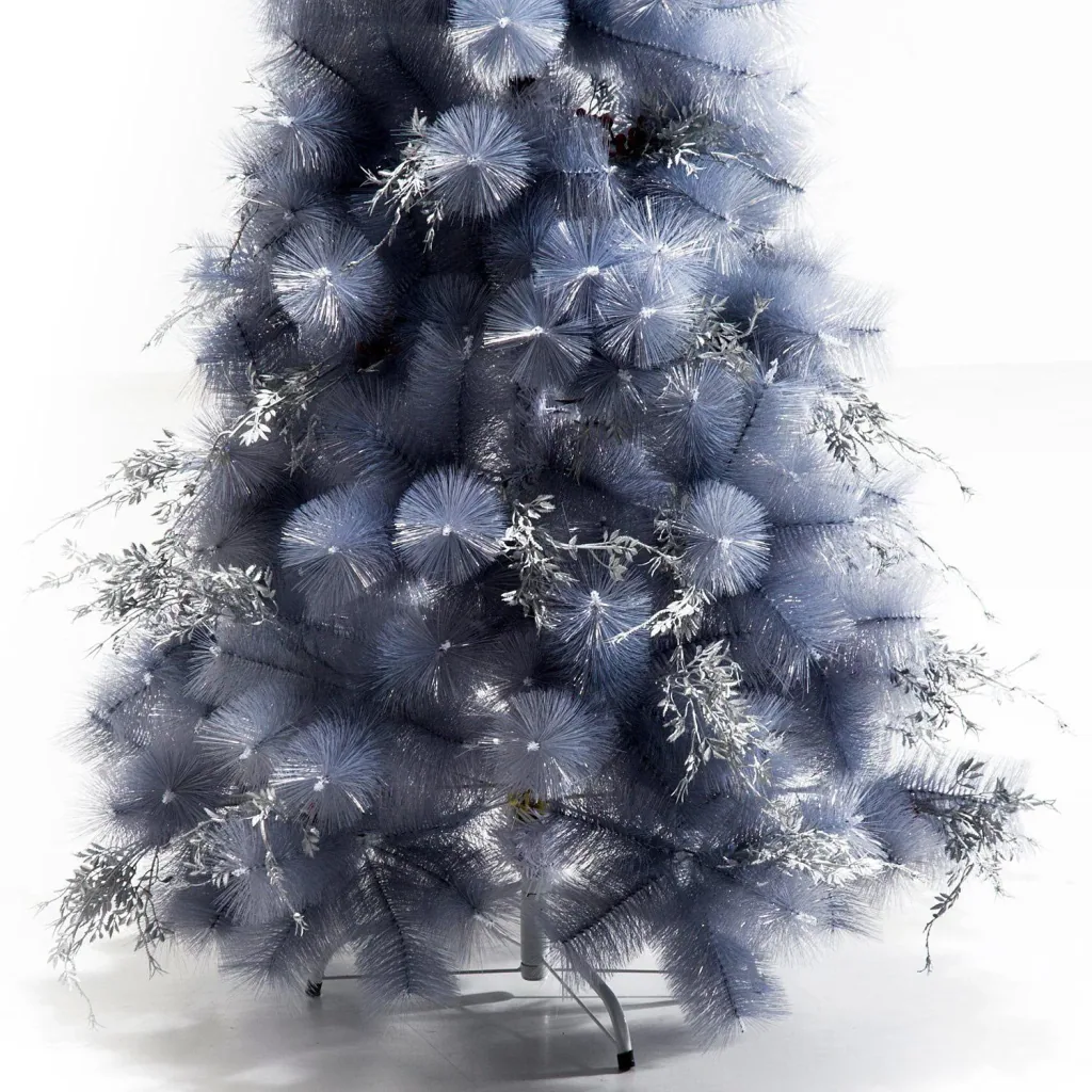 Artificial Christmas tree with silver branches and red berries