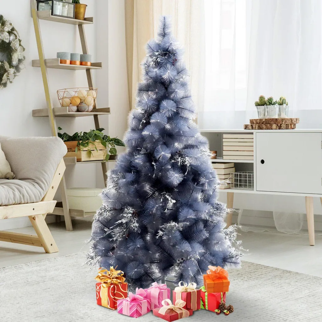 Artificial Christmas tree with silver branches and red berries