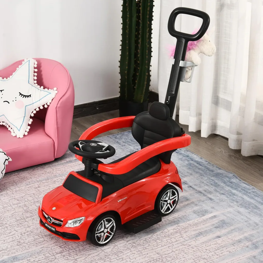 Ride-on car with push and hold bar