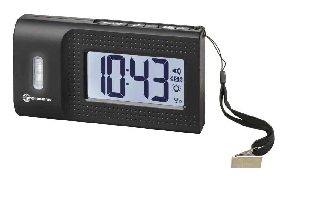 Travel alarm clock with vibrating alarm