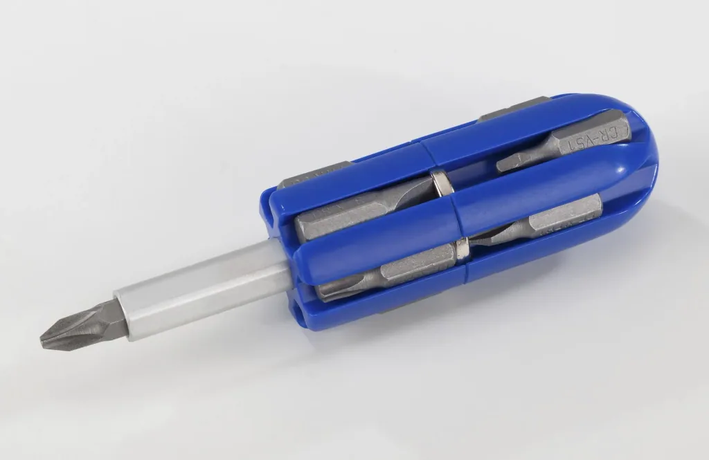 Magnetic bit magazine with holder for manual and machine operation