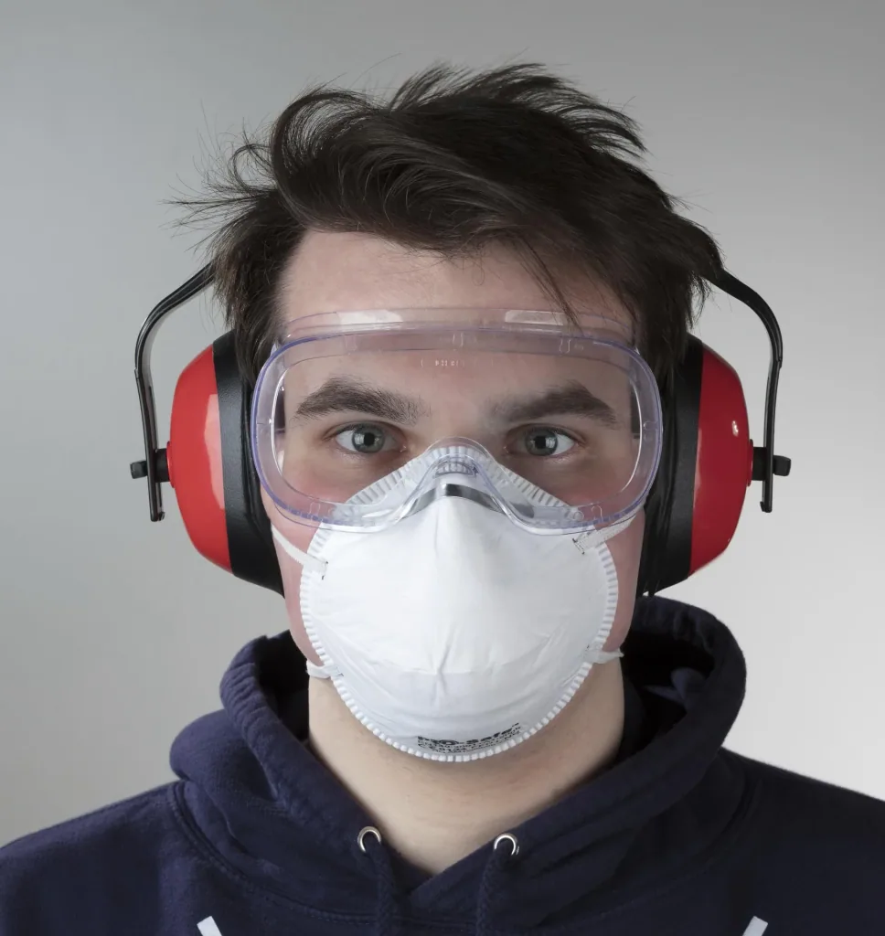 Coarse dust mask including safety goggles and hearing protection
