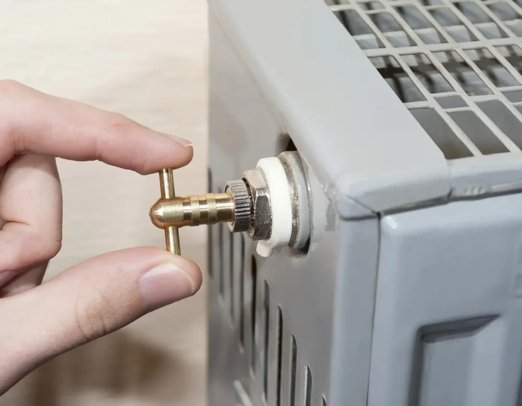Brass bleed key