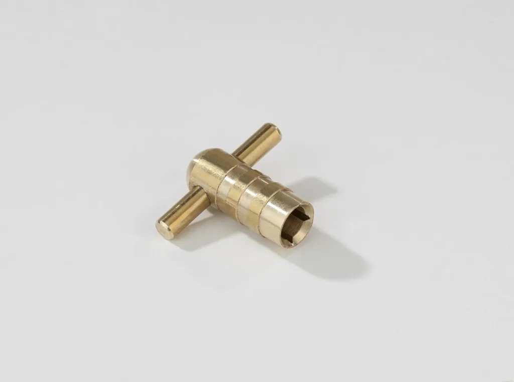 Brass bleed key